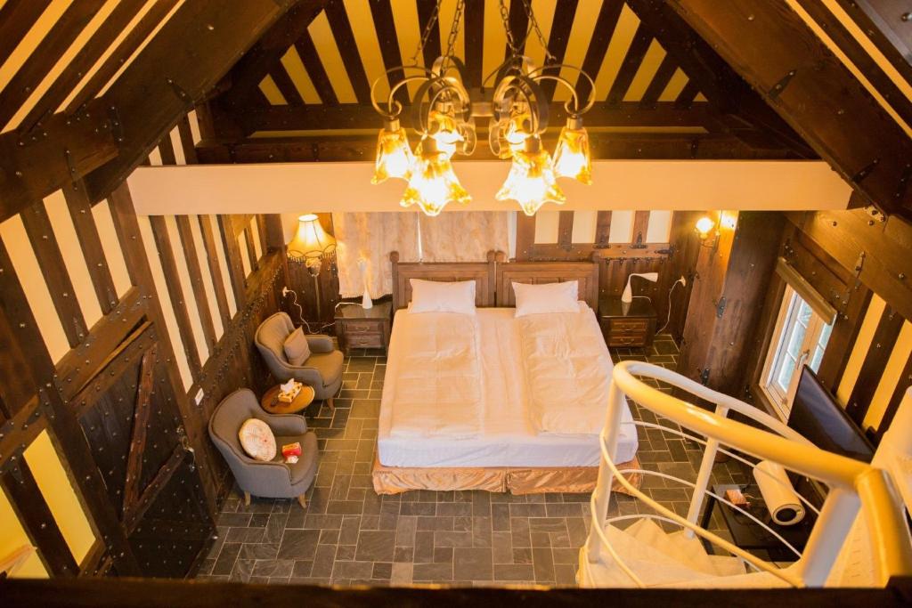 Postel nebo postele na pokoji v ubytování Black Forest Manor