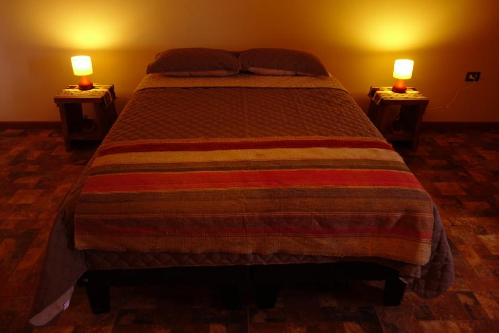 Postel nebo postele na pokoji v ubytování Casa Ckelar Atacama