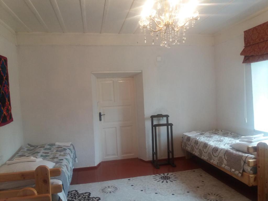 Postel nebo postele na pokoji v ubytování Macedon Guest House
