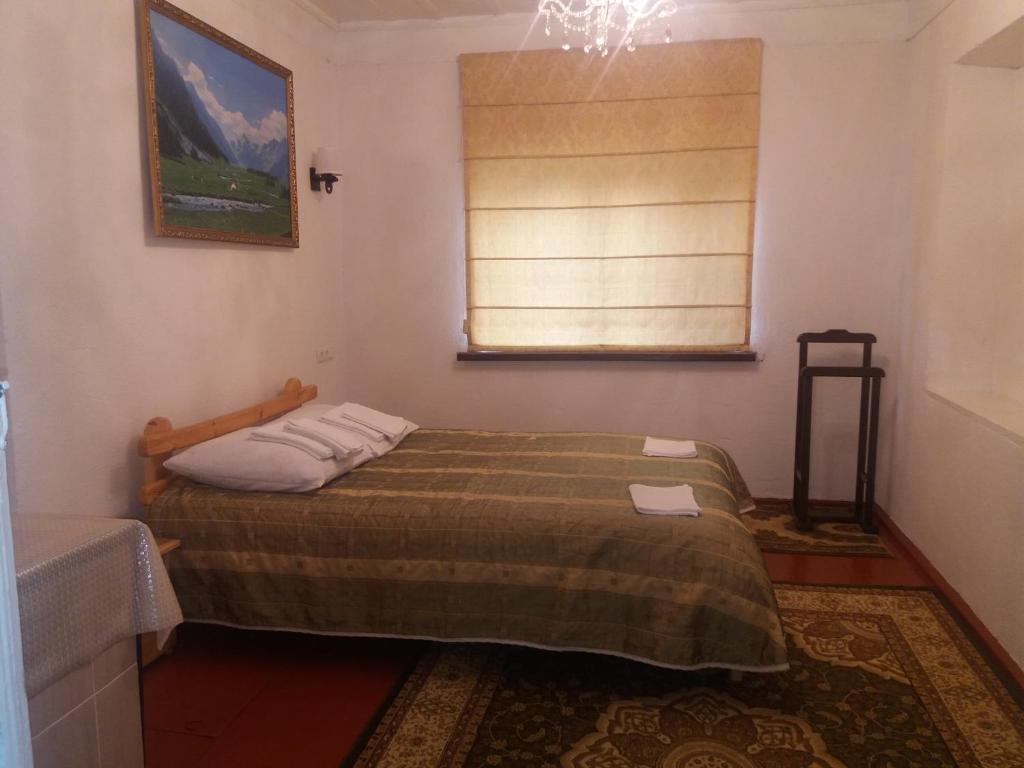 Postel nebo postele na pokoji v ubytování Macedon Guest House