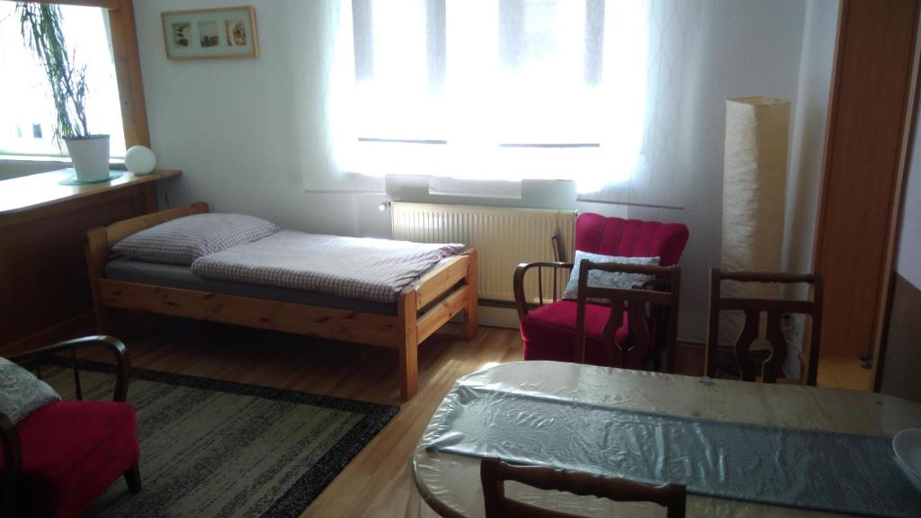 Postel nebo postele na pokoji v ubytování "Klein und Fein"-Monteurzimmer Pohlheim