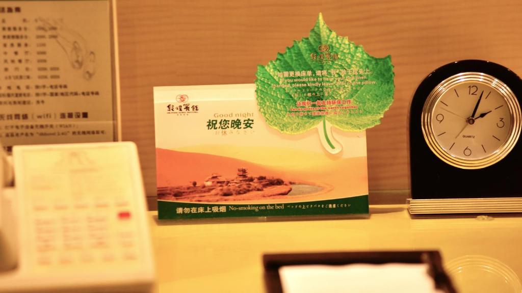 Certifikát, hodnocení, plakát nebo jiný dokument vystavený v ubytování Dunhuang Hotel