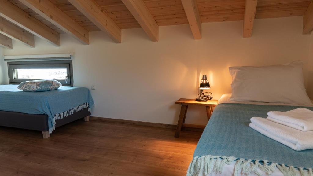 Posteľ alebo postele v izbe v ubytovaní Arhondiko Luxury House