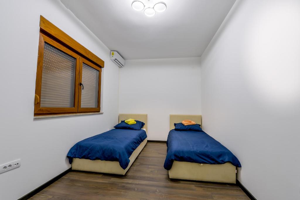 מיטה או מיטות בחדר ב-Dubrovnik Heights