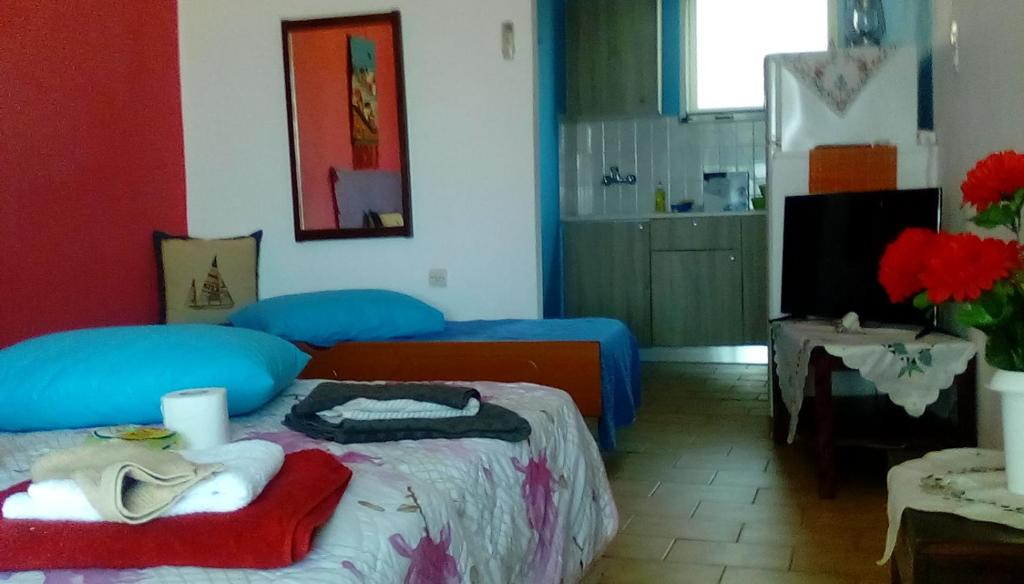 En eller flere senge i et værelse på Aggelsol