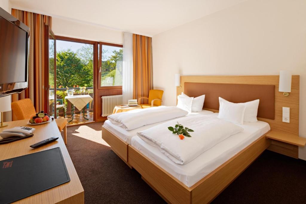 Postel nebo postele na pokoji v ubytování Hotel 3 Könige