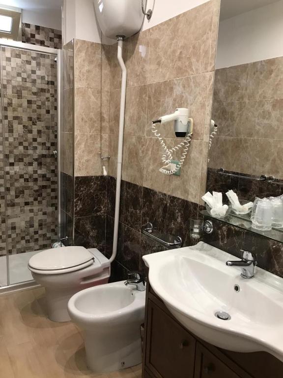 Koupelna v ubytování IG-Tysandros Hotel Apartments