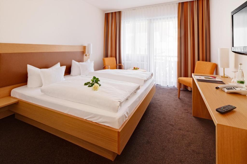 Postel nebo postele na pokoji v ubytování Hotel 3 Könige
