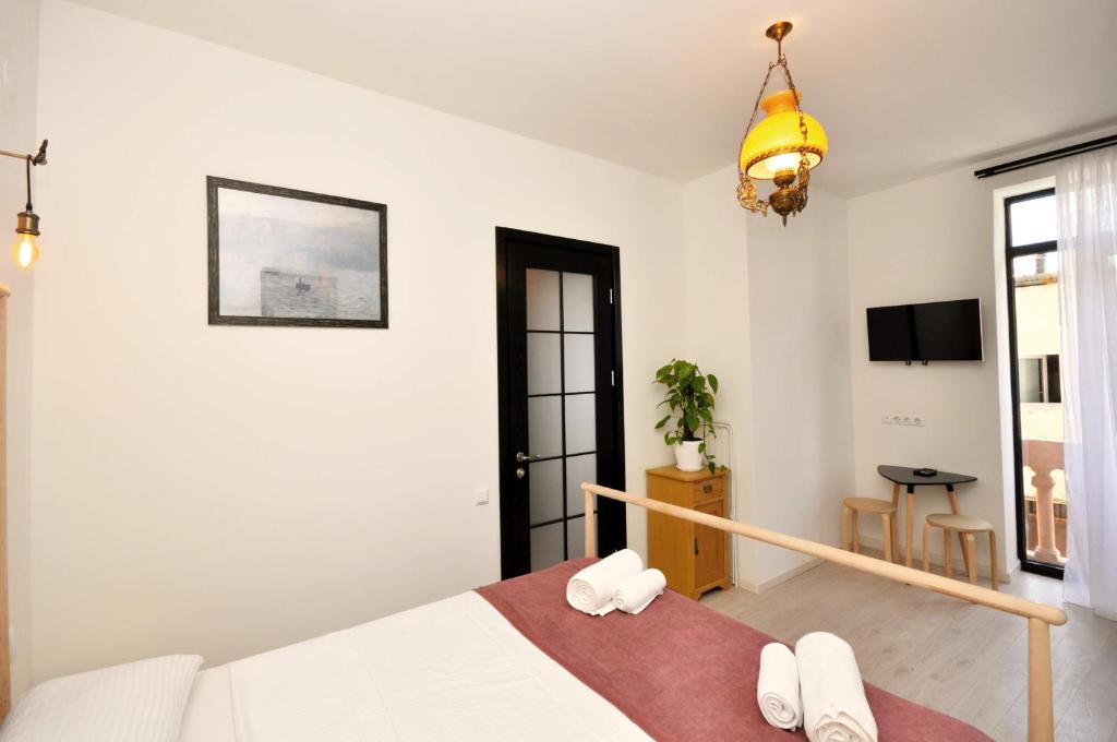 Postel nebo postele na pokoji v ubytování Centre Apartment Old Tbilisi