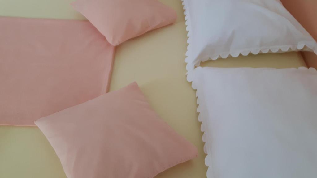 Postel nebo postele na pokoji v ubytování Apartments Feniks