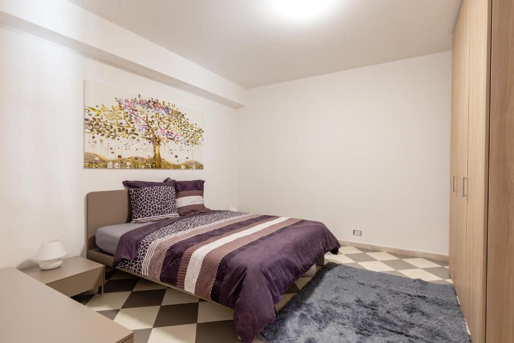 Łóżko lub łóżka w pokoju w obiekcie Residenza del Duca - Casteldaccia 2 camere