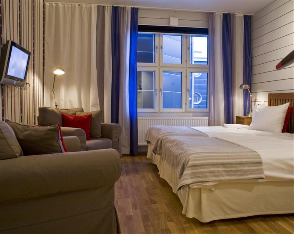 Postel nebo postele na pokoji v ubytování Hotel Örebro