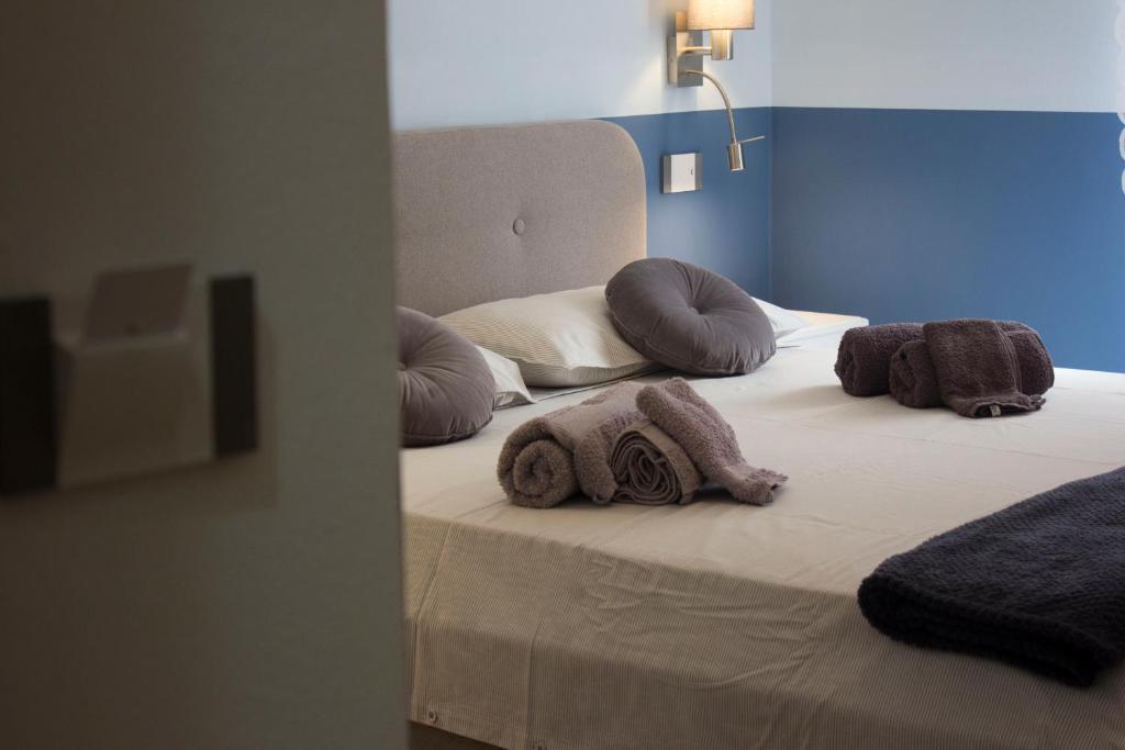 Postel nebo postele na pokoji v ubytování Shardan Guest House