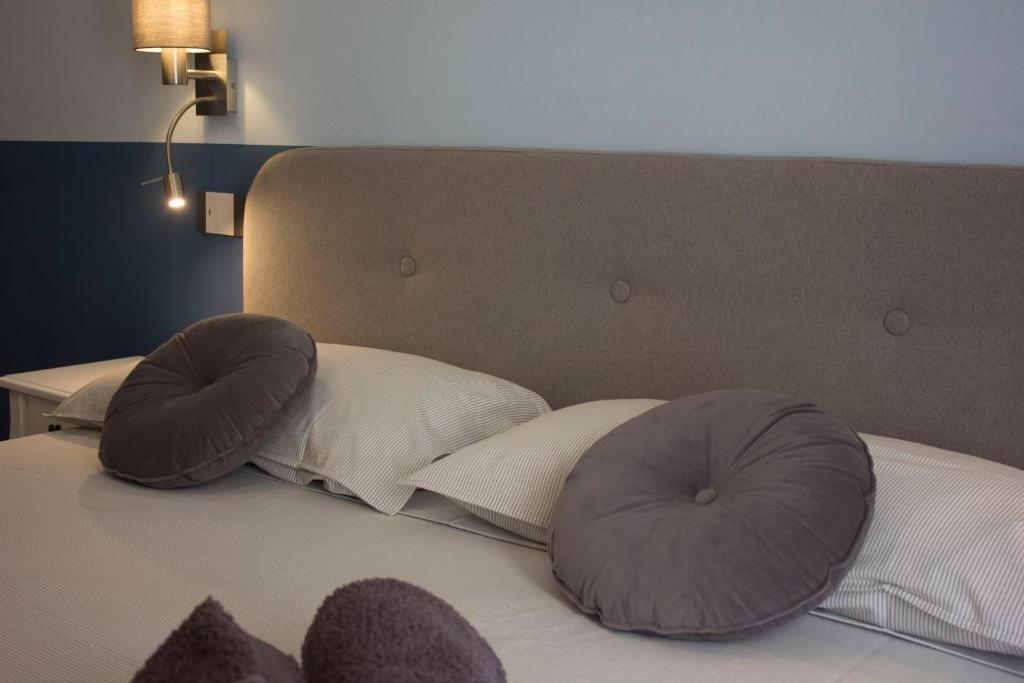 Postel nebo postele na pokoji v ubytování Shardan Guest House