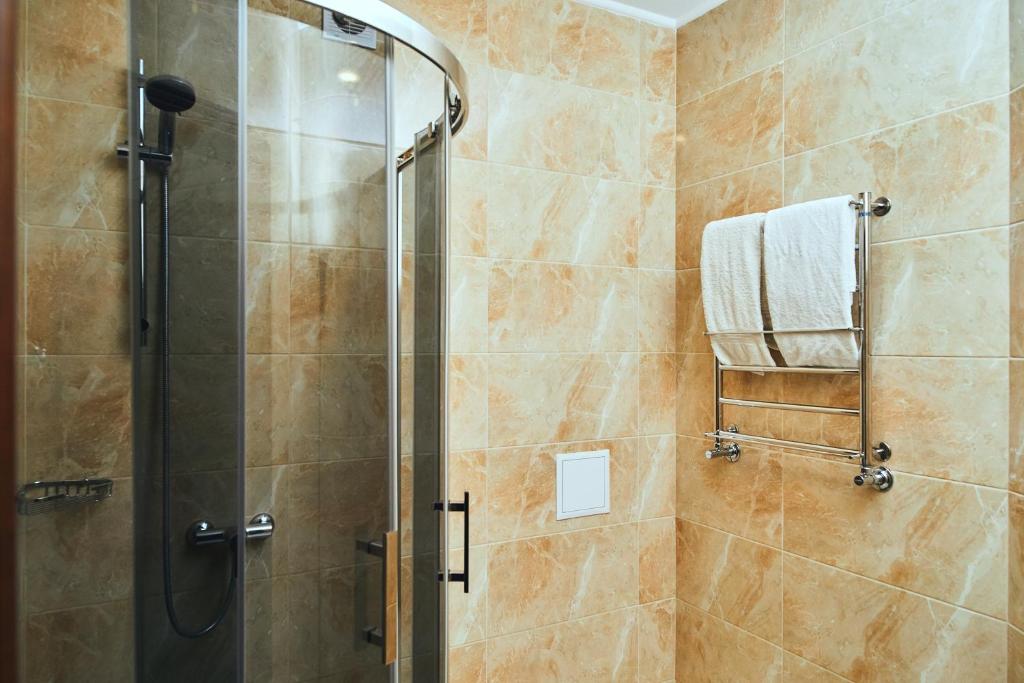 Koupelna v ubytování Hotel Patriarshyi