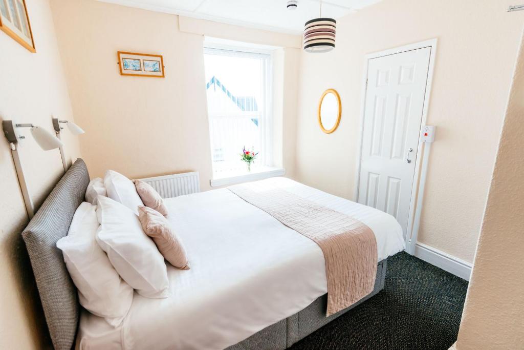 Letto o letti in una camera di Surfside Stop