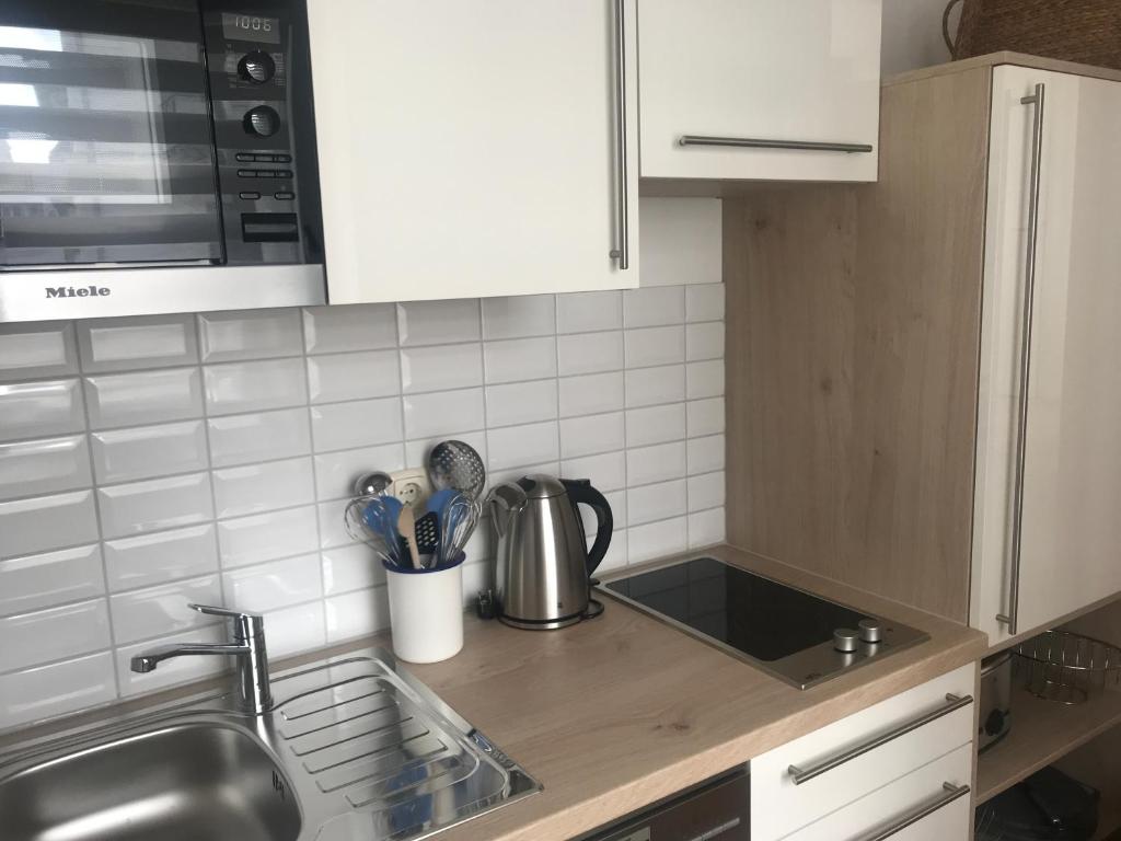 Kuchyň nebo kuchyňský kout v ubytování Villa Bergfried