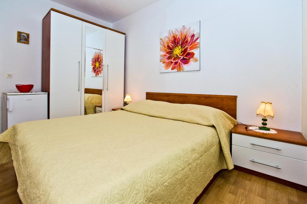 Postel nebo postele na pokoji v ubytování Rooms Barbarić