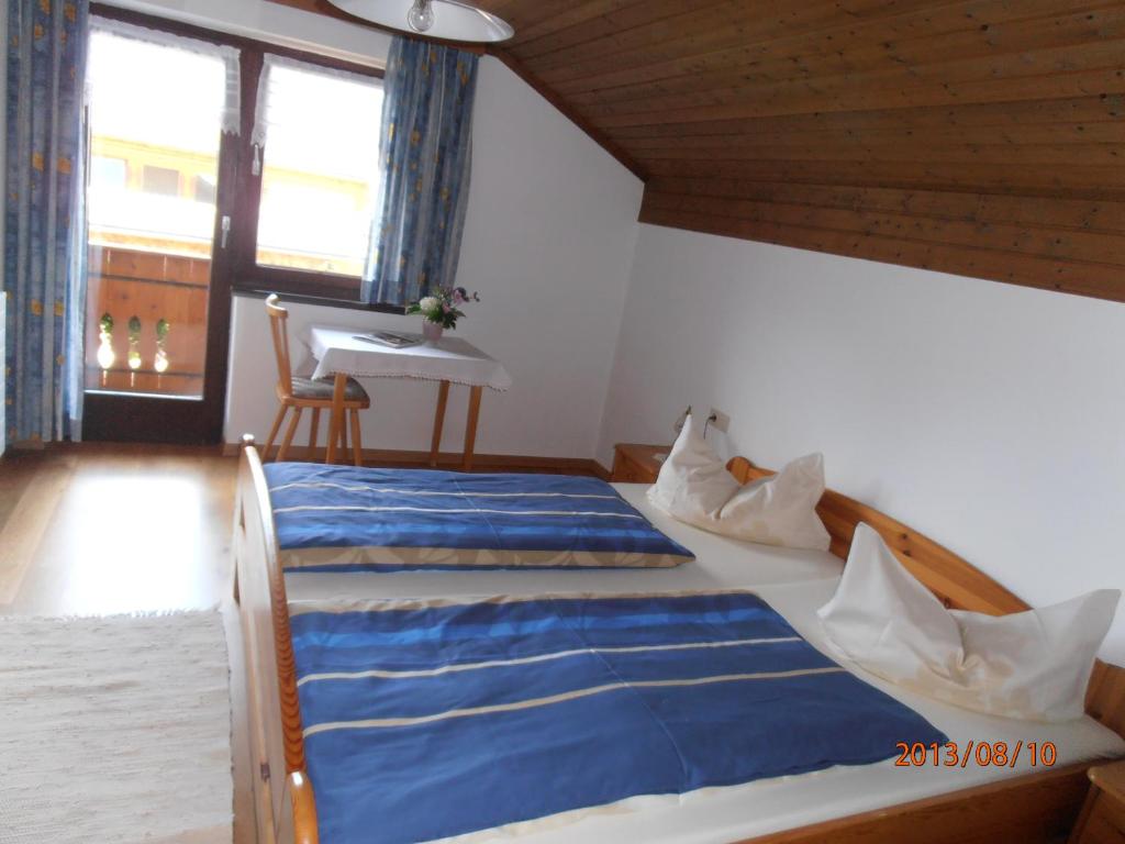 Postel nebo postele na pokoji v ubytování Haus Schneider