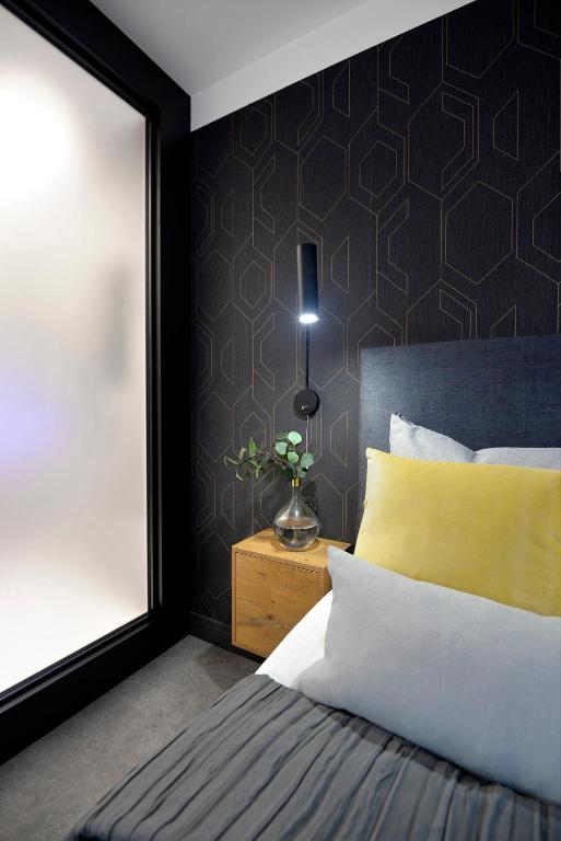 Posteľ alebo postele v izbe v ubytovaní Elite Apartments Waterlane Free Swimming Pool Access