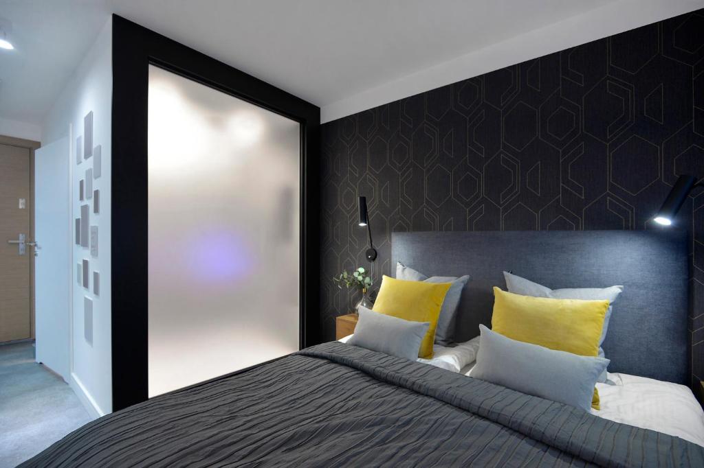 Posteľ alebo postele v izbe v ubytovaní Elite Apartments Waterlane Free Swimming Pool Access