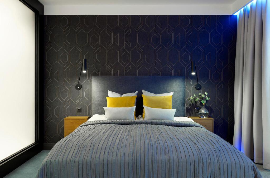 Posteľ alebo postele v izbe v ubytovaní Elite Apartments Waterlane Free Swimming Pool Access