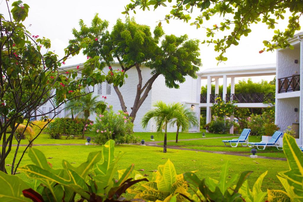 Zahrada ubytování Coyaba Beach Resort