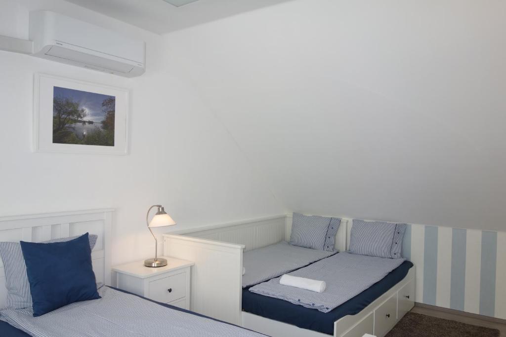 Postel nebo postele na pokoji v ubytování Lednicko-valtický apartmán