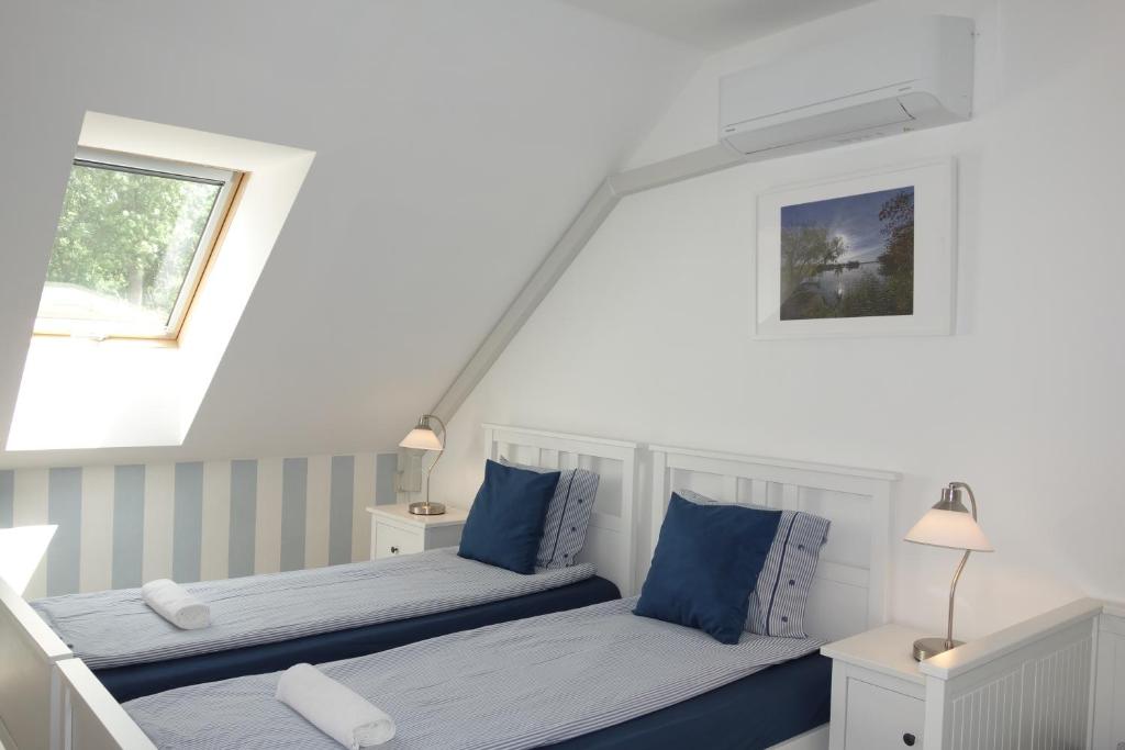 Postel nebo postele na pokoji v ubytování Lednicko-valtický apartmán