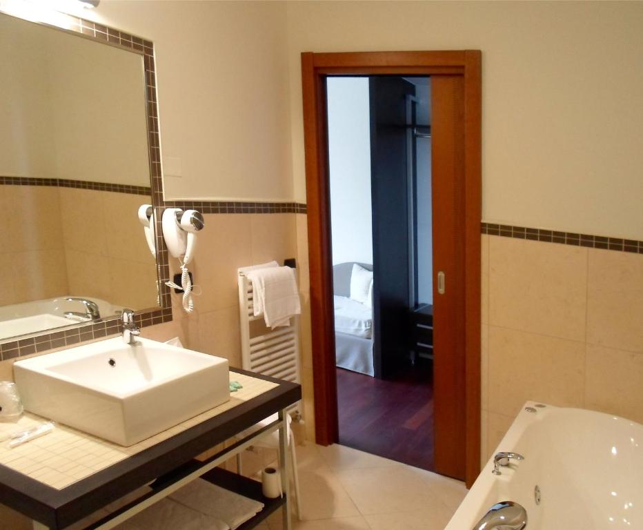 Koupelna v ubytování Hotel Le Macine