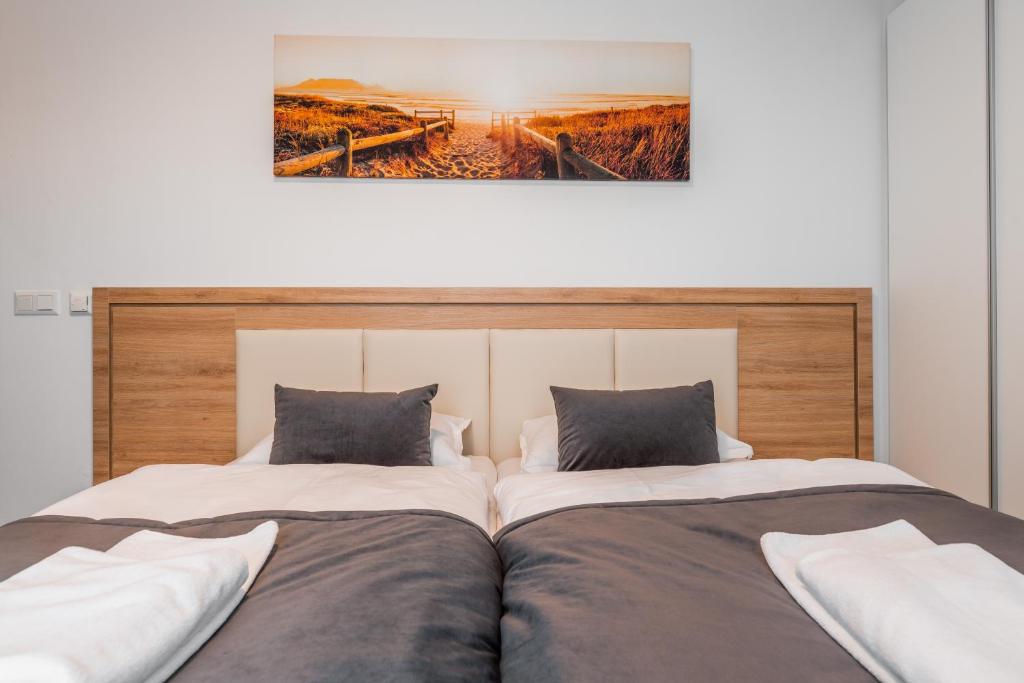 Postel nebo postele na pokoji v ubytování Apartmány pri vstupe do Aquaparku