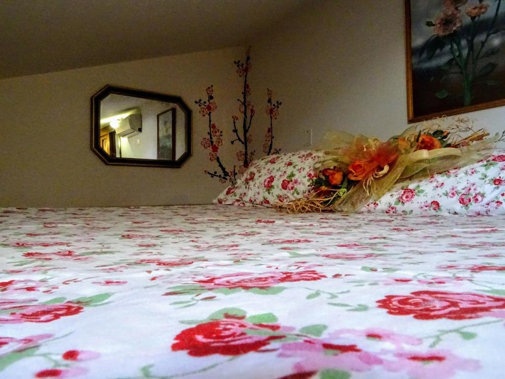 Posteľ alebo postele v izbe v ubytovaní Le Mimose B&B