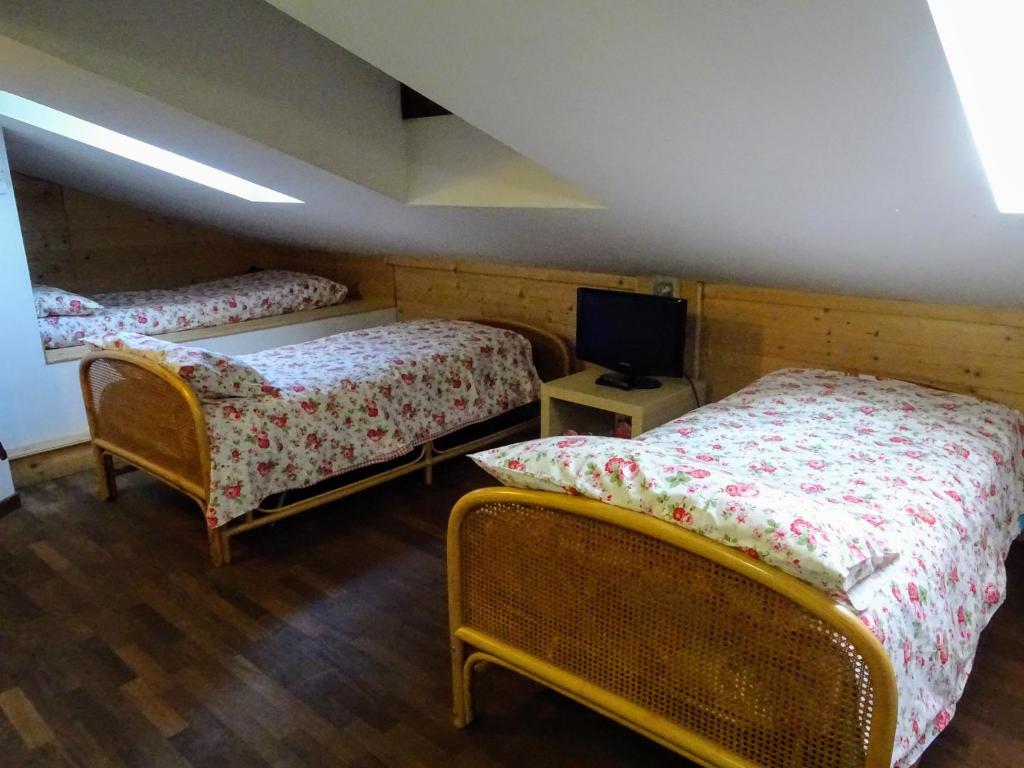 Posteľ alebo postele v izbe v ubytovaní Le Mimose B&B