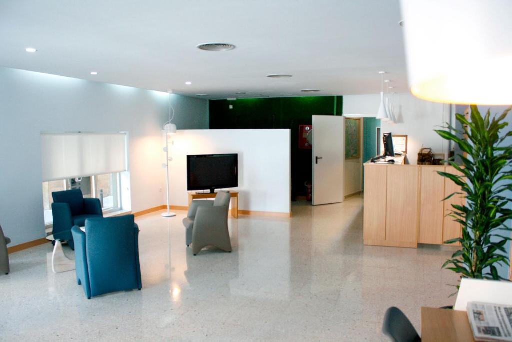 TV a/nebo společenská místnost v ubytování Hotel Universal Murcia