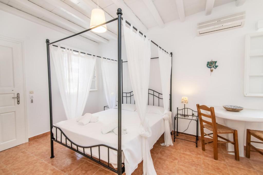 Postel nebo postele na pokoji v ubytování Didymes Studios