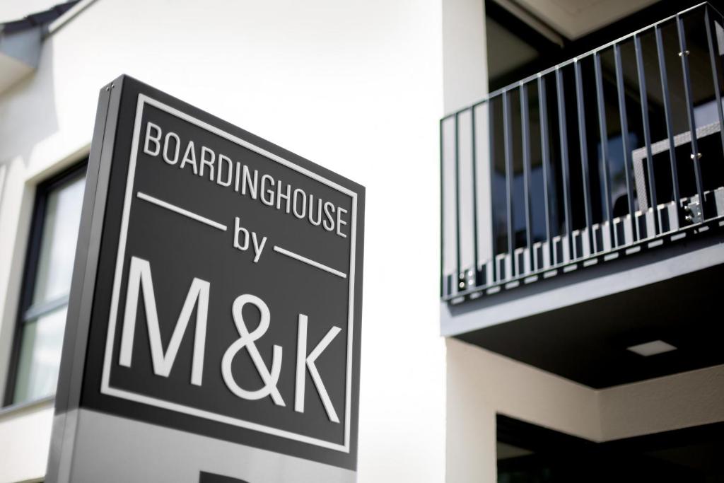 Certifikát, hodnocení, plakát nebo jiný dokument vystavený v ubytování Boardinghouse by M&K