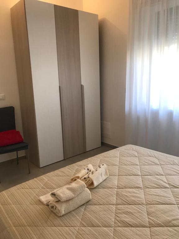 Posteľ alebo postele v izbe v ubytovaní Mare a KmZERO