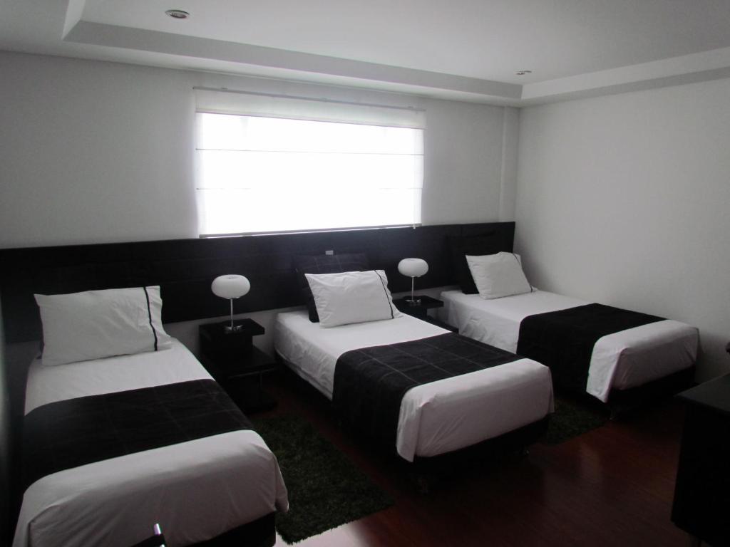 Postel nebo postele na pokoji v ubytování Hotel Classic