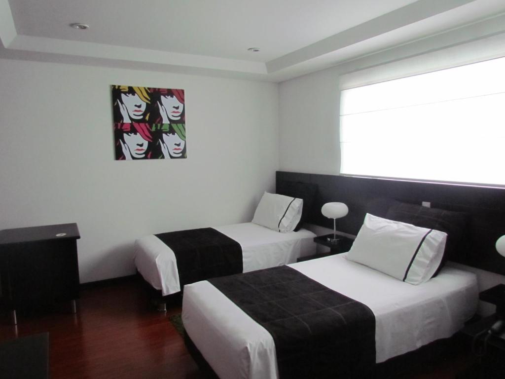 Postel nebo postele na pokoji v ubytování Hotel Classic