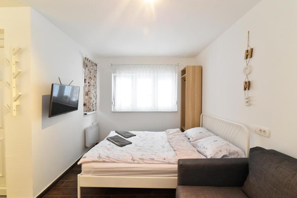 Postel nebo postele na pokoji v ubytování Hostel Temza