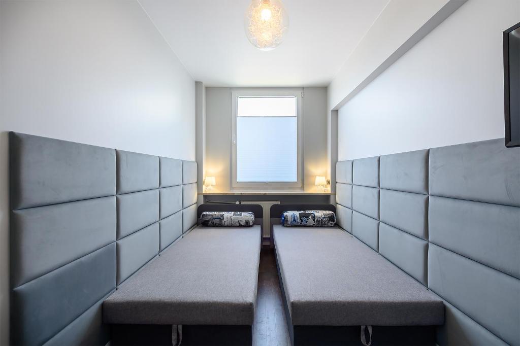 Posteľ alebo postele v izbe v ubytovaní ORION Downtown Apartment by PinPoint