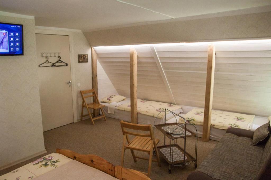 Postel nebo postele na pokoji v ubytování Viesu māja Sprīdīši