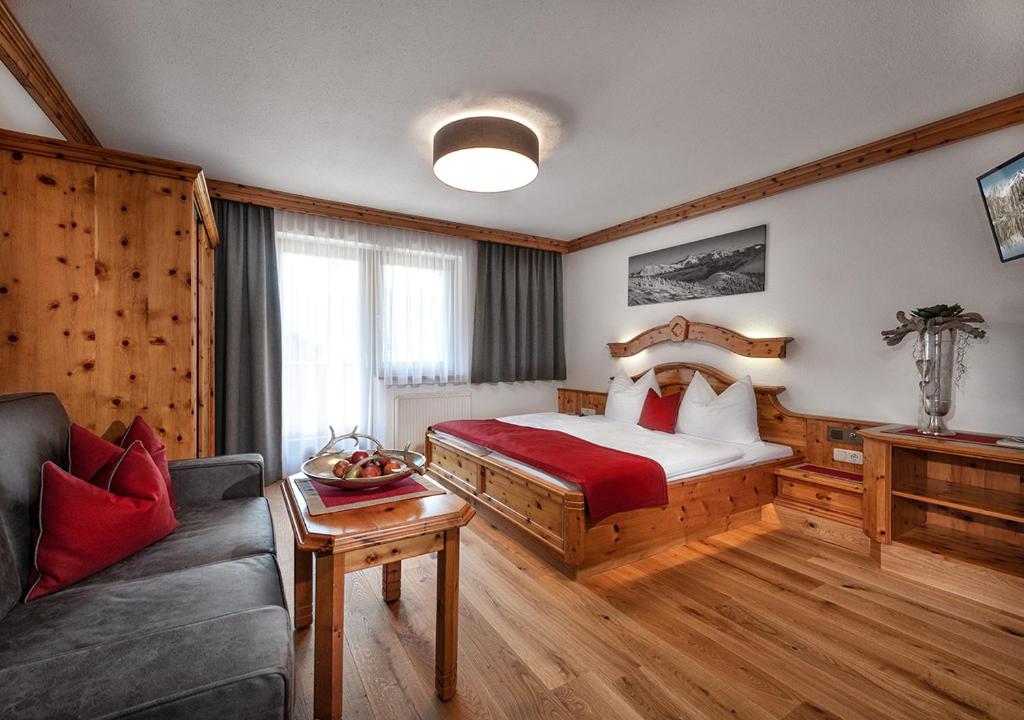 Postel nebo postele na pokoji v ubytování Hotel Hubertushof