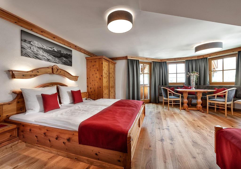 Postel nebo postele na pokoji v ubytování Hotel Hubertushof