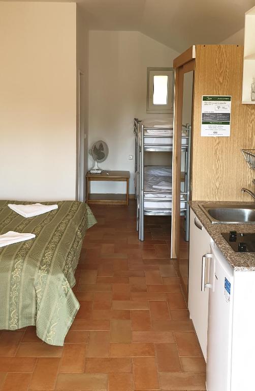 Kuchyň nebo kuchyňský kout v ubytování Resort Beach Nová Živohošť