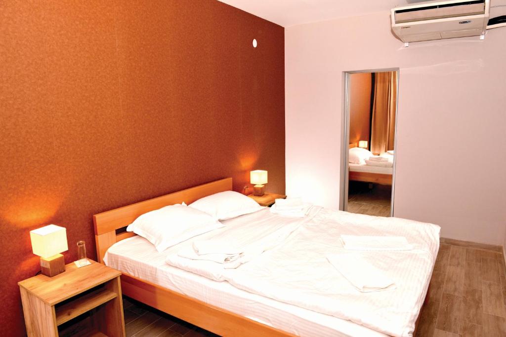 Llit o llits en una habitació de Hotel Timok
