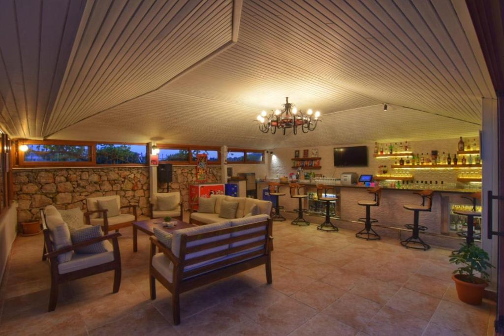 A seating area at Olympos Hotel - Adults Only