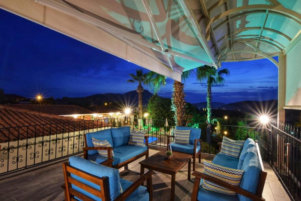 A balcony or terrace at Olympos Hotel - Adults Only