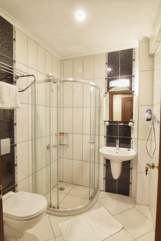 A bathroom at Olympos Hotel - Adults Only