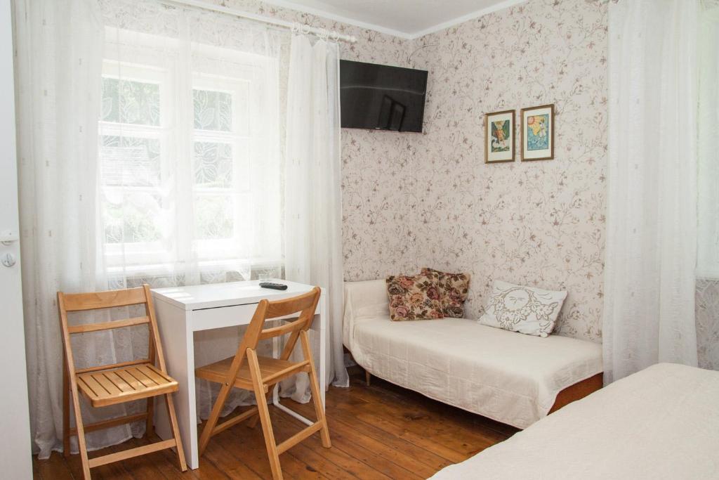 Postel nebo postele na pokoji v ubytování Viesu māja Sprīdīši